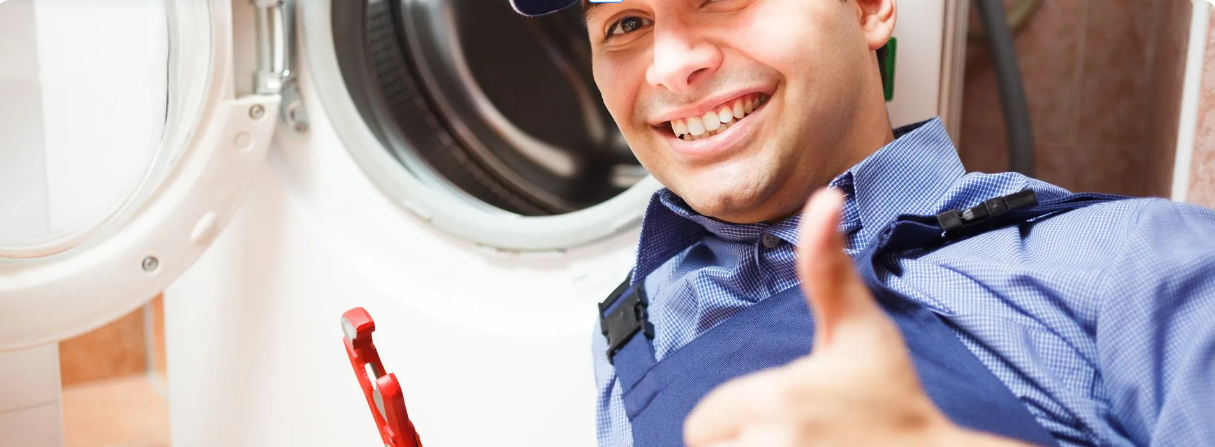 Appliance repair technician inspecting a home appliance in Lincoln, NE.